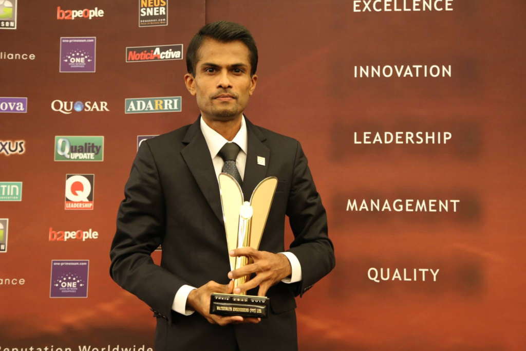 Waterways Engineering representative holding the WQC quality award